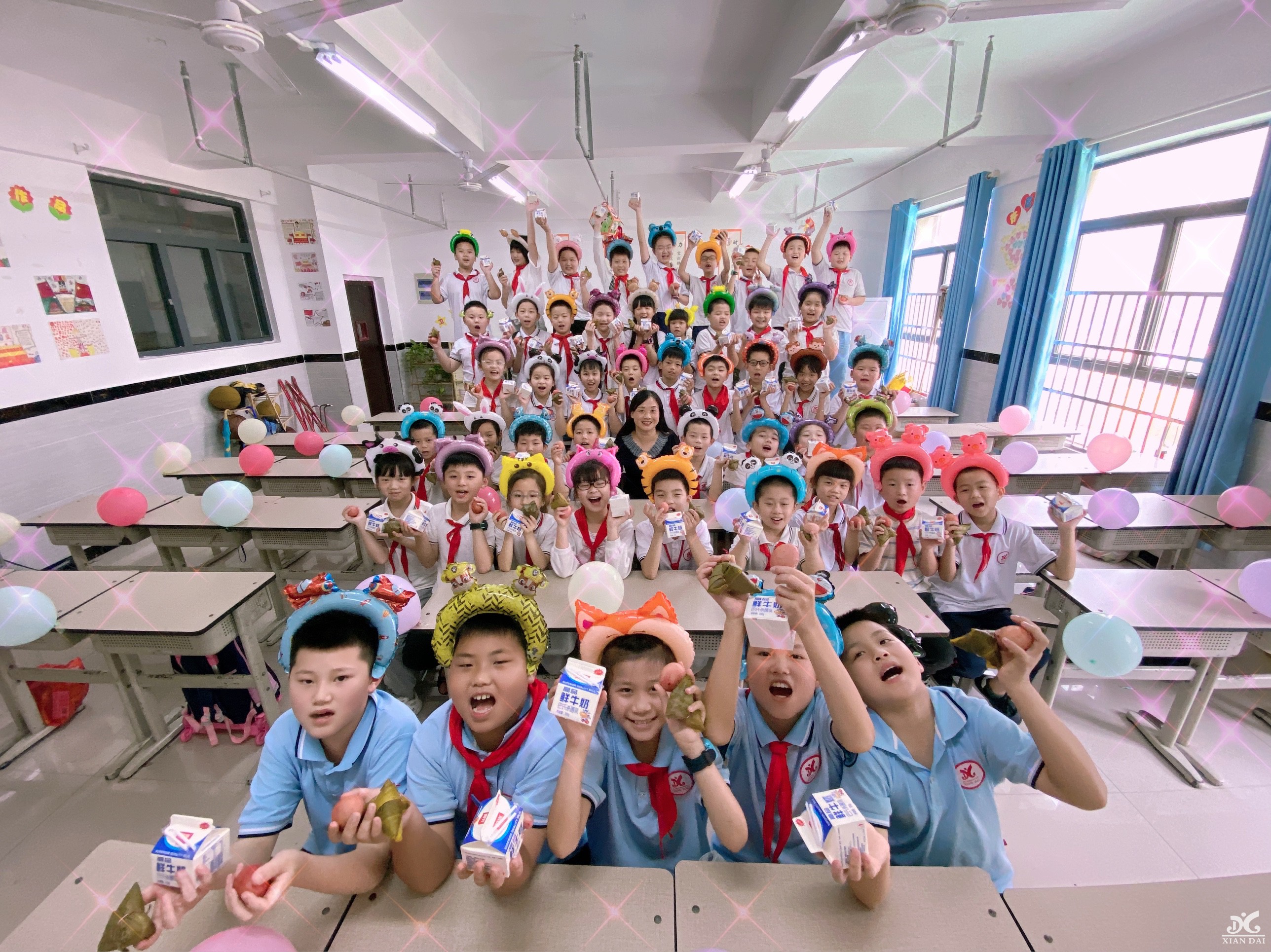 南昌現(xiàn)代外國(guó)語(yǔ)學(xué)校開(kāi)展“歡樂(lè)六一，遇上粽香端午”慶?；顒?dòng)